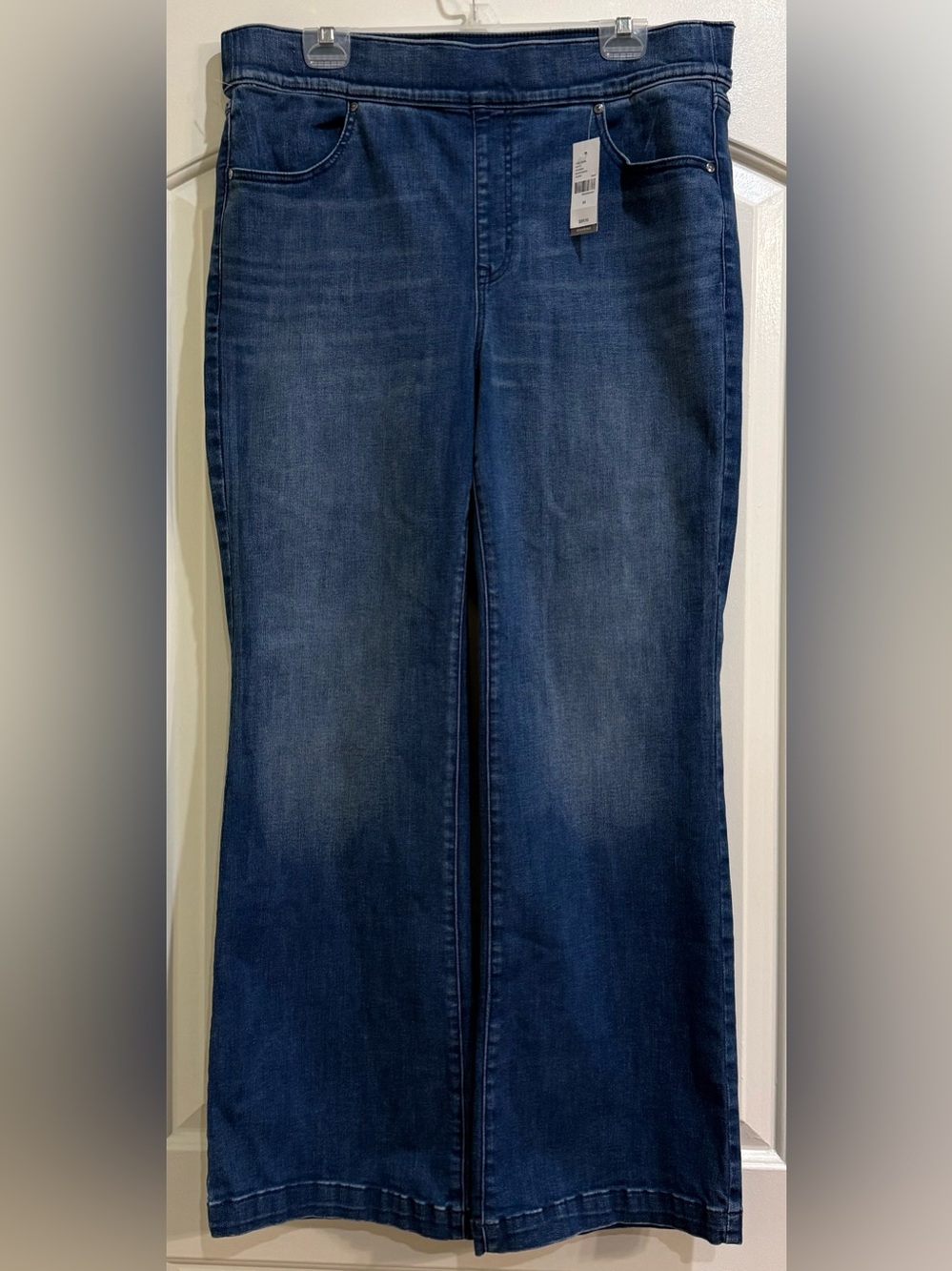 Lane Brant pull on high rise boot cut jeans. Size 16. New with tags.